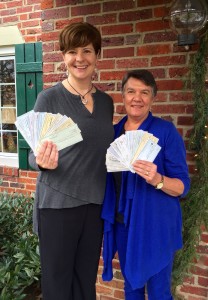 Adrienne Griffen, Founder and Executive Director of PSVa and Doris Parker, 100 Women Who Care member display this quarter's donation.
